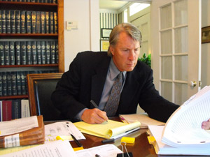 an attorney working in his cabin